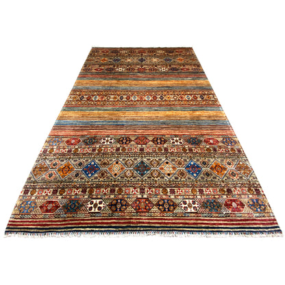 Colorful Khorjin rug with geometric borders, multicolored stripes, and fringes.