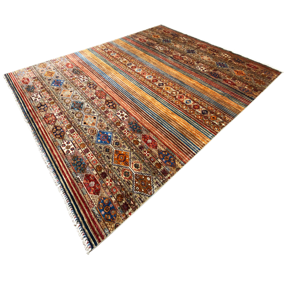 Colorful Khorjin rug spread out, featuring intricate patterns, a striped look, and a fringed edge.