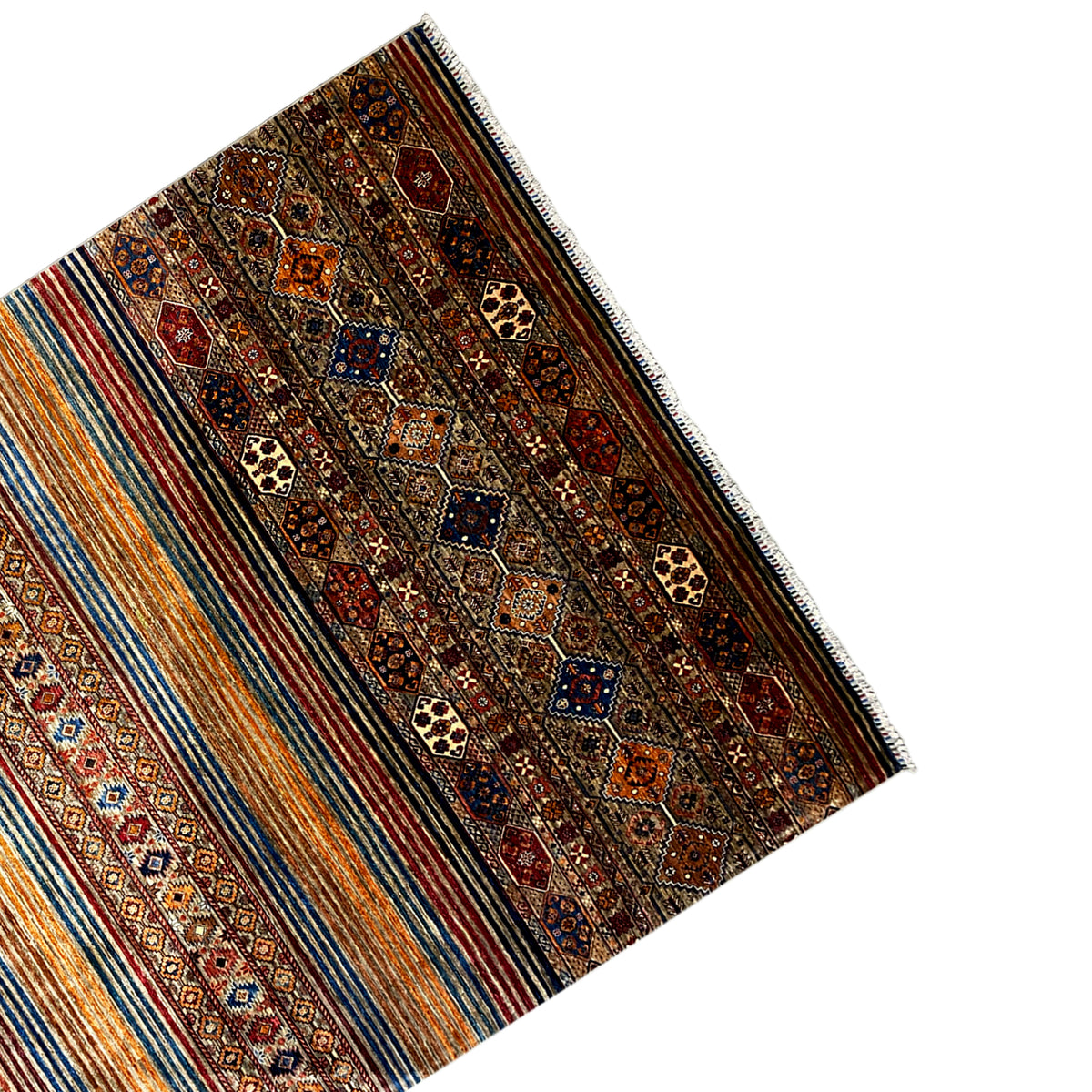 Khorjin rug viewed from the side, with borders and multicolored stripes, fringes along the edge.