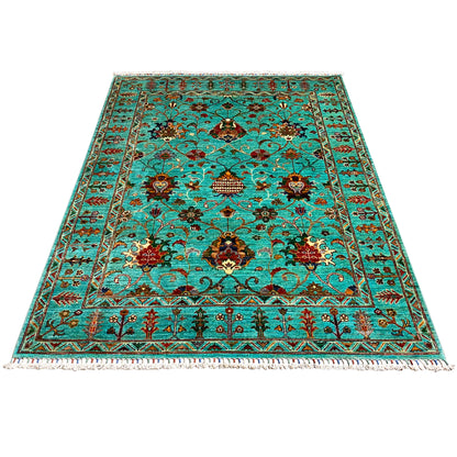 Rectangular turquoise Khorjin rug with a detailed floral and vine pattern
