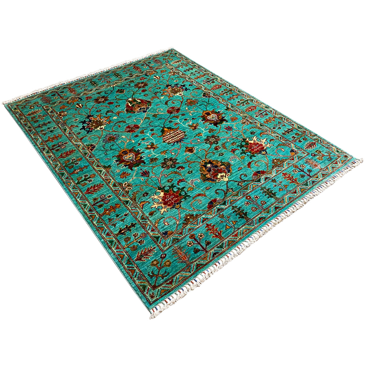 Turquoise Khorjin rug at an angle: floral medallions, floral ornaments, border