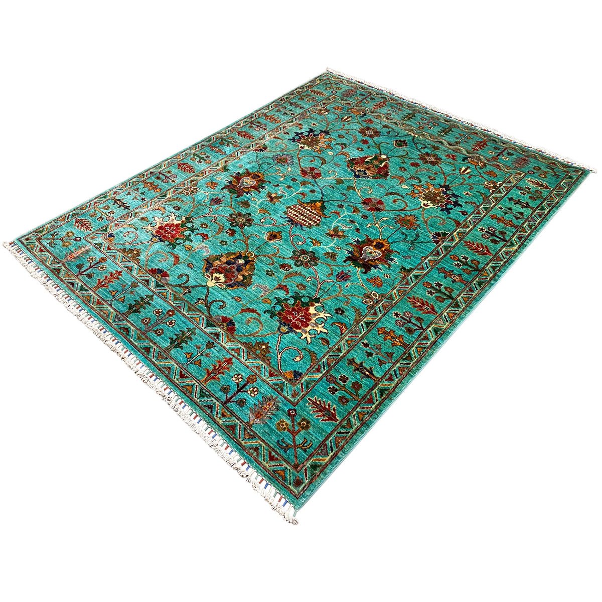 Artistic turquoise Khorjin rug, diagonal view, multicolored floral vines and border