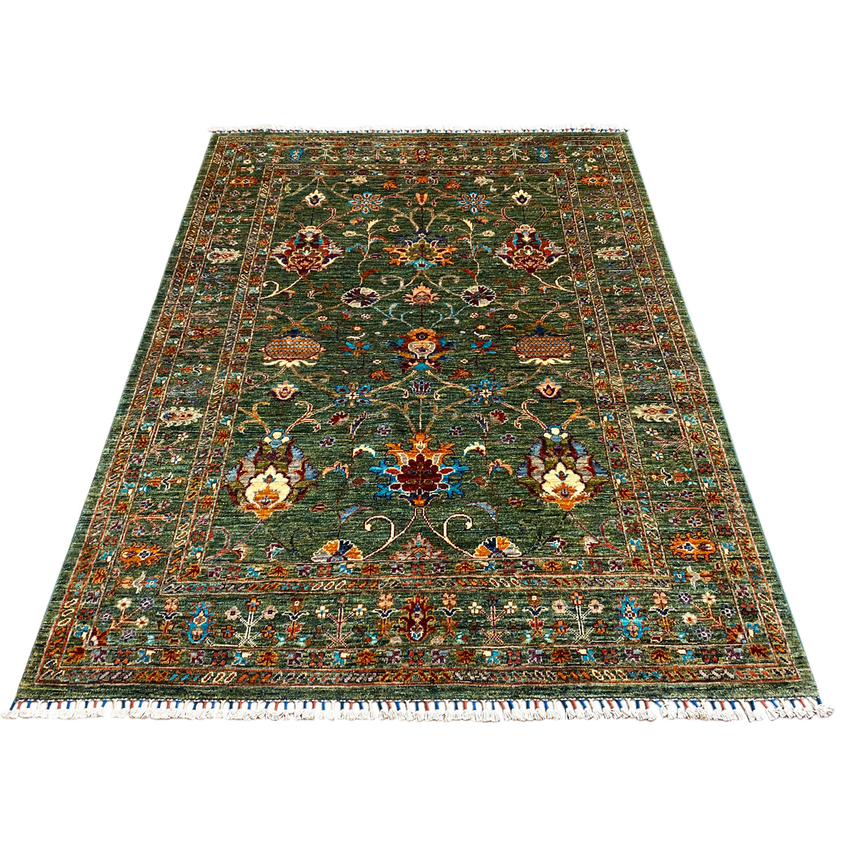 Khorjin rug in dark green, large central field with floral patterns