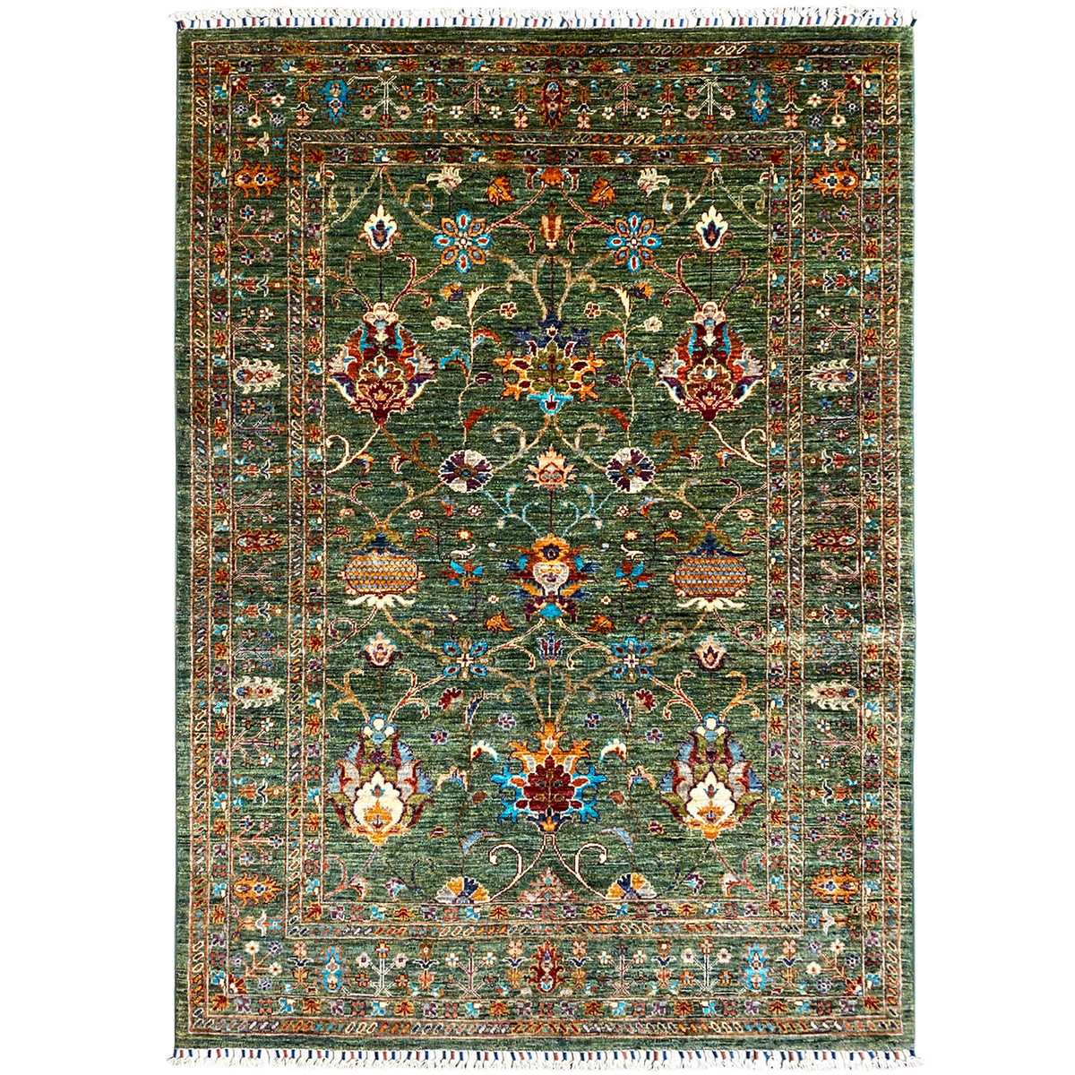 Khorjin rug in dark green with colorful ornamentation and fringes