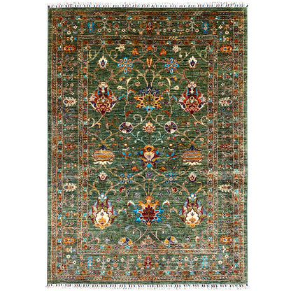 Khorjin rug in dark green with colorful ornamentation and fringes