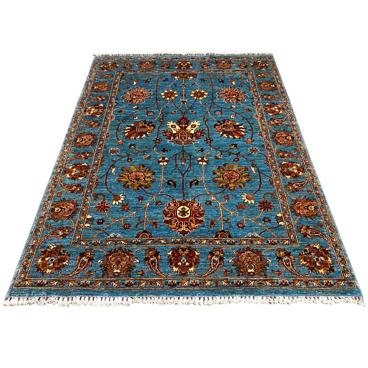 Blue Khorjin rug, rectangular with floral medallions and decorative border