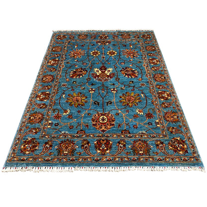 Blue Khorjin rug, rectangular with floral medallions and decorative border