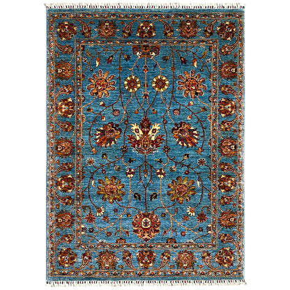 Blue Khorjin rug with a floral ornamental pattern and fringes, rectangular