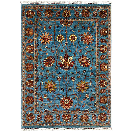 Blue Khorjin rug with a floral ornamental pattern and fringes, rectangular