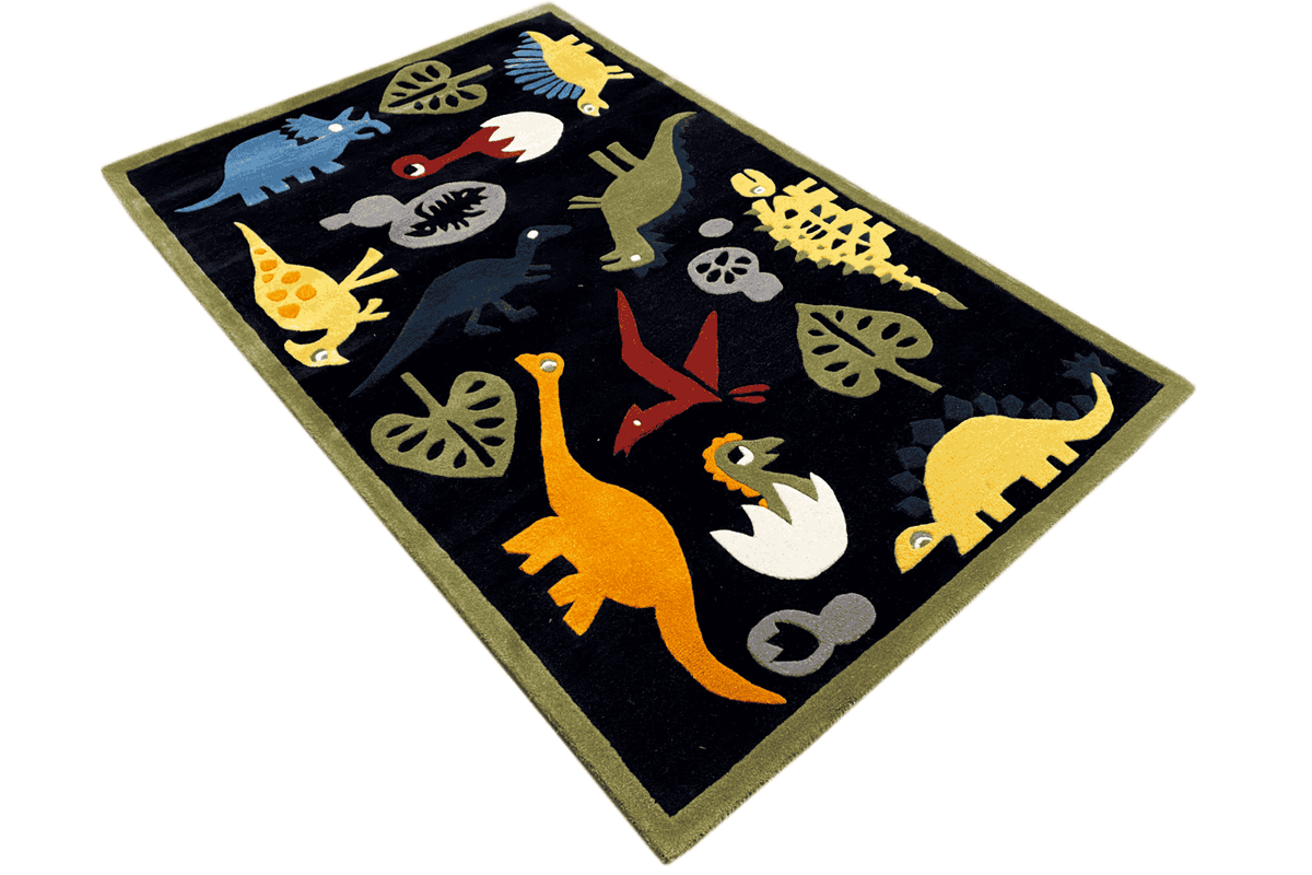 Children's rug with dinosaur motifs, dark blue, photographed at an angle, 120x180 cm