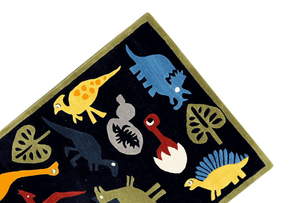 Corner detail of the children's rug with dinosaurs, dark blue background, yellow-orange elements