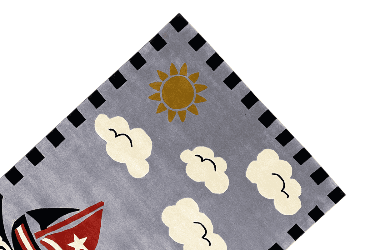 Children's sailing boat rug from above: gray background with sun, clouds, and diamond border