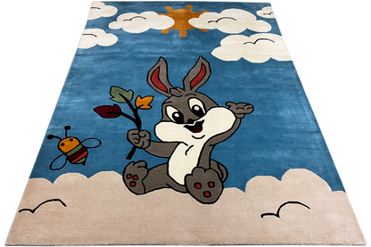 Children's rug with a sitting rabbit and bee among clouds, blue and beige