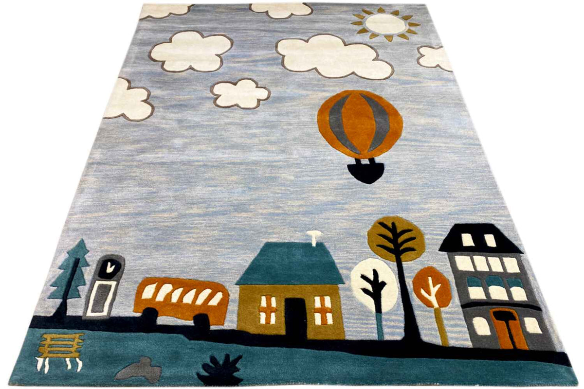 Hand-tufted wool rug with a hot-air balloon, clouds, houses, and warm accents.