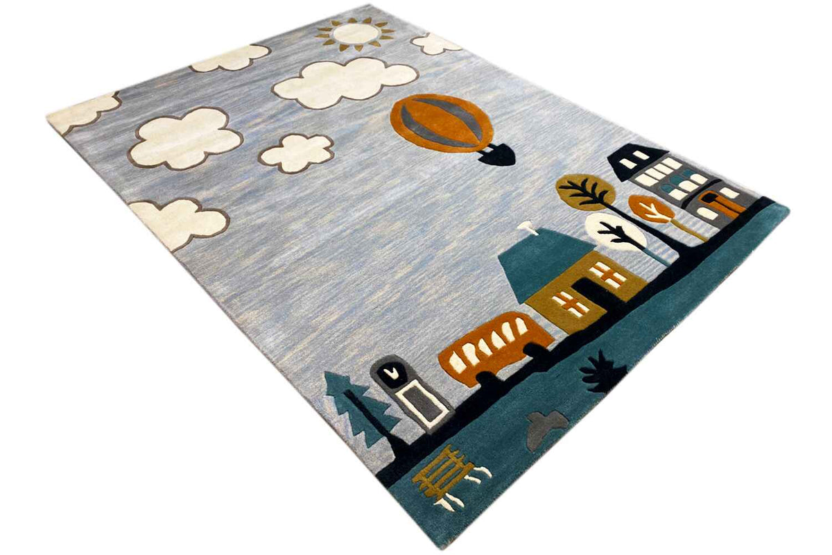 Hand-tufted wool rug with a hot-air balloon, clouds, and cityscape in cheerful colors.