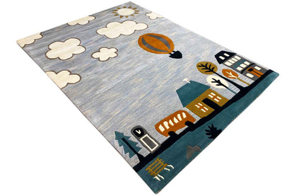 Hand-tufted wool rug with a hot-air balloon, clouds, and cityscape in cheerful colors.