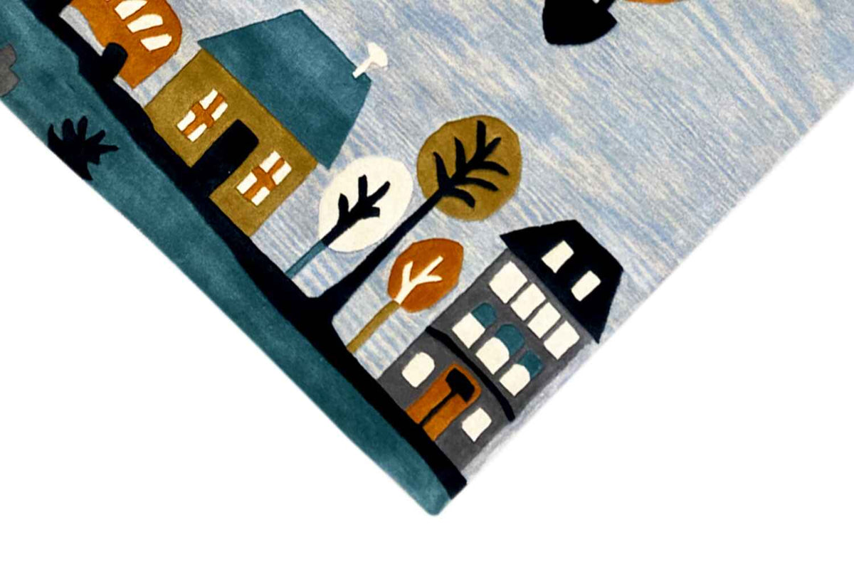 Hand-tufted wool rug corner with house, tree, and hot-air balloon elements.