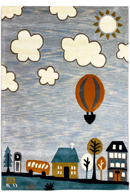 Hand-tufted wool rug with a hot-air balloon, clouds, and city houses in a children's design.