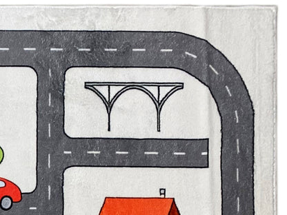 Detail Kinderteppich: Brückenbogen über Straße, mit Fahrspuren und Markierungen.