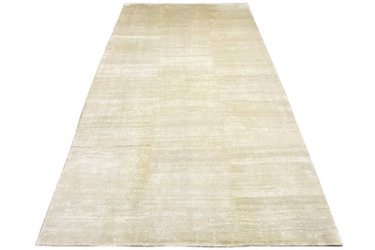 Light beige Gabbeh rug, rectangular, subtle linear pattern with a fine texture