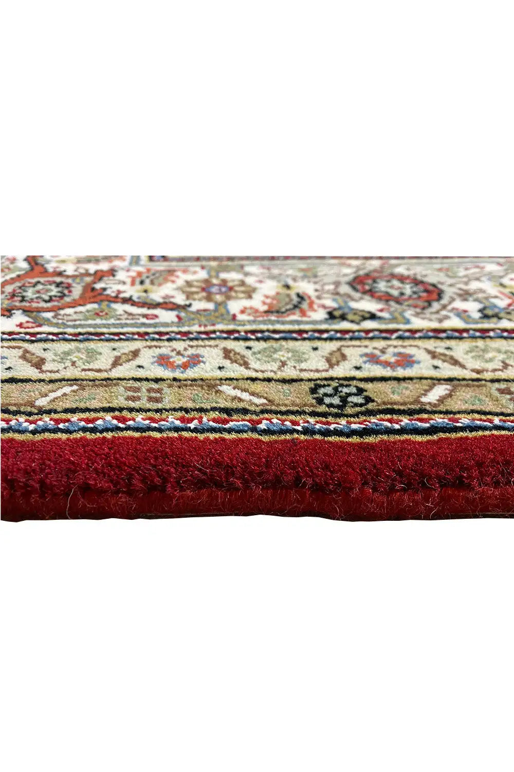 Carpet edge with padded border and short fringe trim, multicolored
