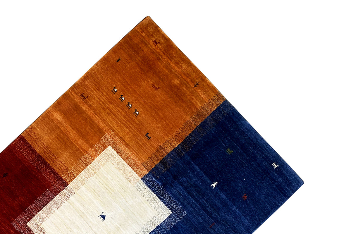 Gabbeh rug viewed from above with a brown border, blue stripe, and cream field