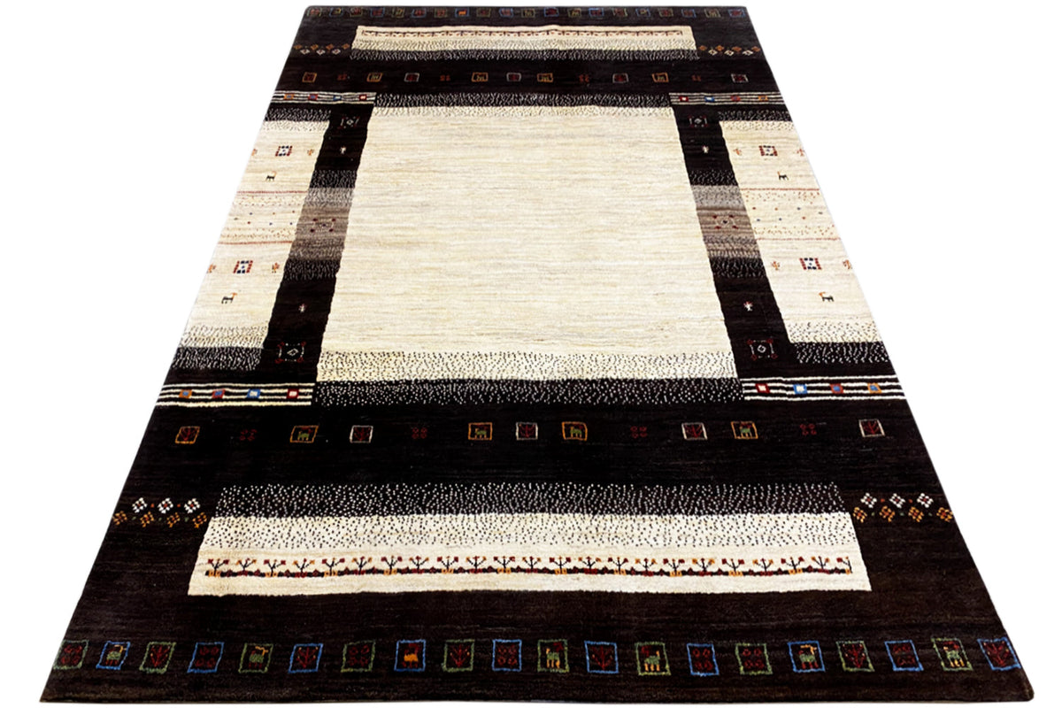 Gabbeh rug (298x196 cm), rectangular, with dark borders and a wide cream field