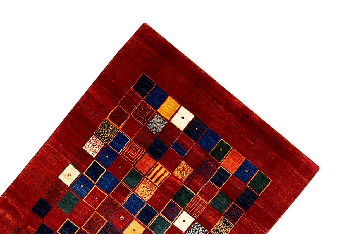 Gabbeh rug 302x202 cm corner view with red pile and colorful squares