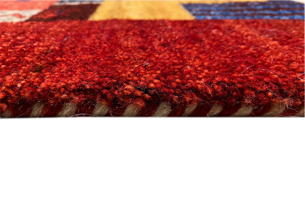Close-up of the red carpet surface with a dense pile texture