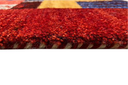 Close-up of the red carpet surface with a dense pile texture