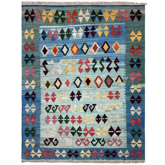 Blue kilim rug with a striped pattern of diamonds and crosses, fringed edges