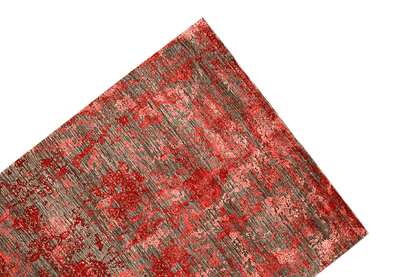Carpet area positioned at an angle: red-gray pattern with a clearly visible edge