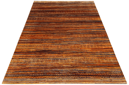 Rug with diagonal stripes, brown and orange with blue accents