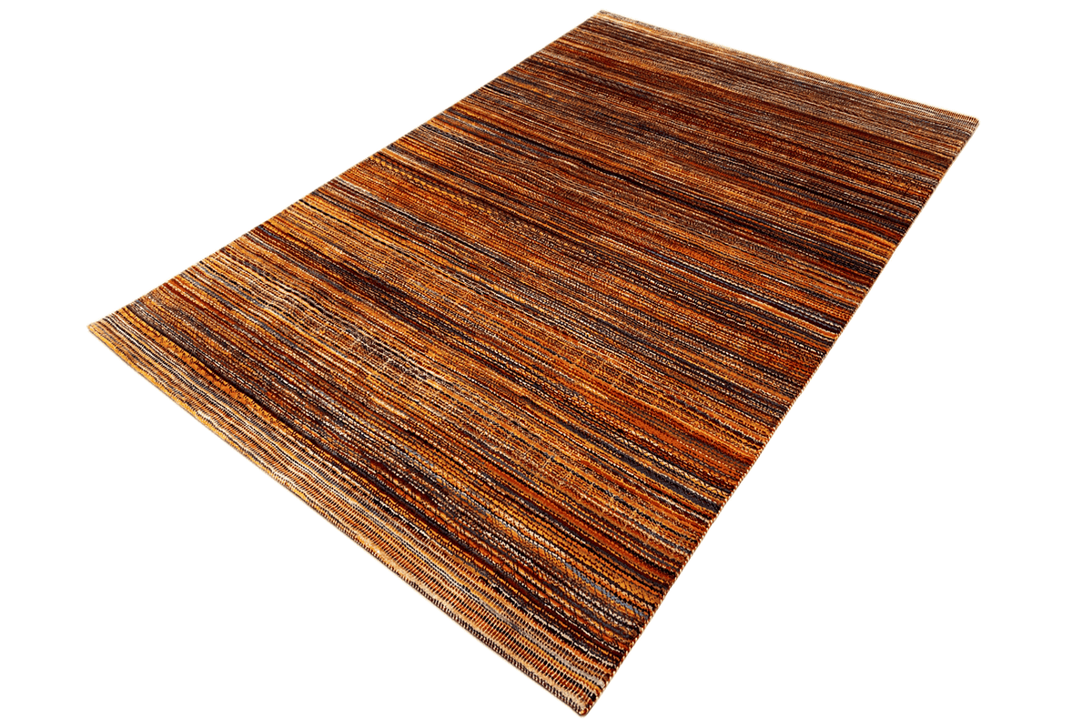 Rug with a subtle striped pattern, predominantly brown and orange