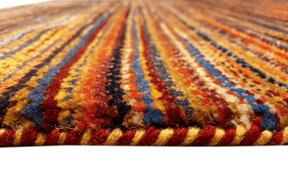 Carpet detail: multicolored threads with a fringe-like edge