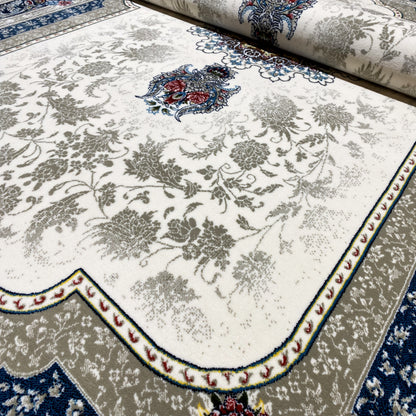 Cream-colored rug 170x240 cm with a blue ornamental pattern and border