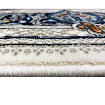 Close-up: fringe and edge of a cream-colored Oriental rug with a blue detailed border