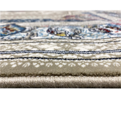 Beige rug: border with blue pattern, visible pile height, and fringed edges