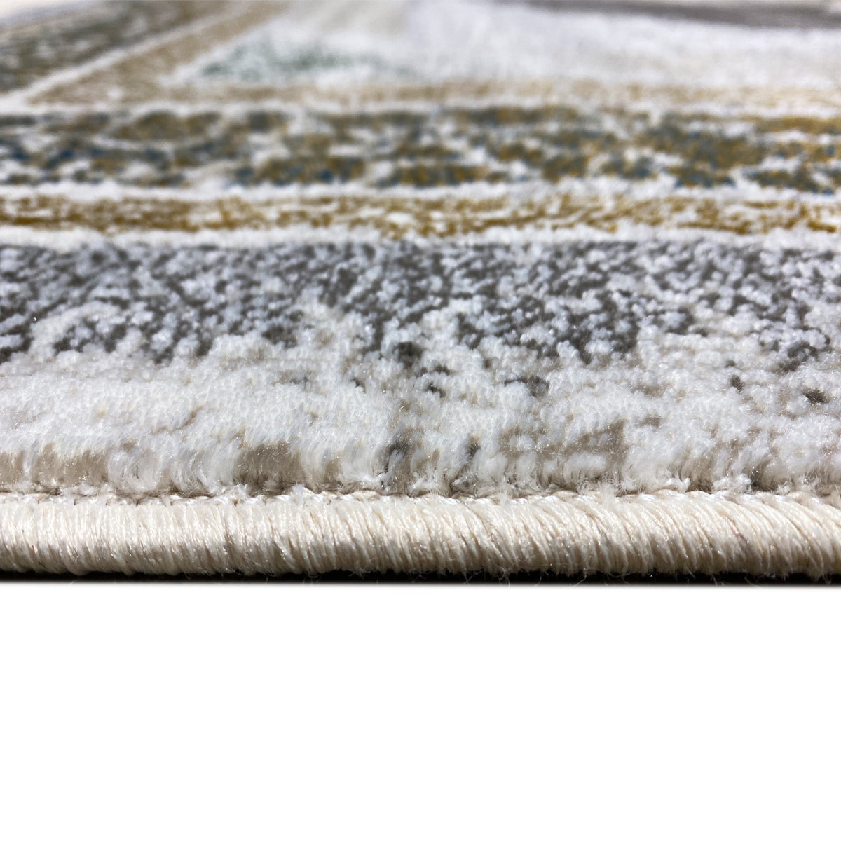 Cream rug 170x240 cm close-up: pile texture and bound edge with fringes