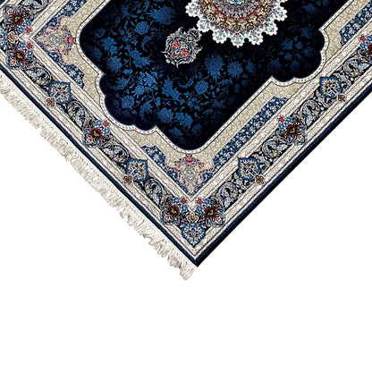 Navy blue oriental rug corner with a light patterned border and fringes