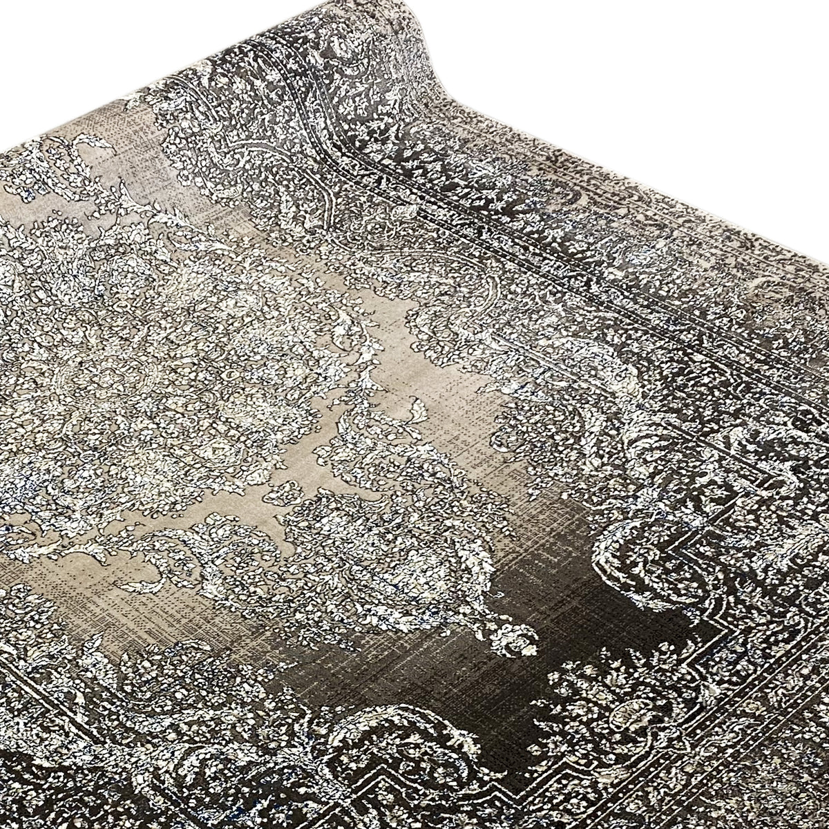 Beige rug with silver and black ornaments, fine detailed texture