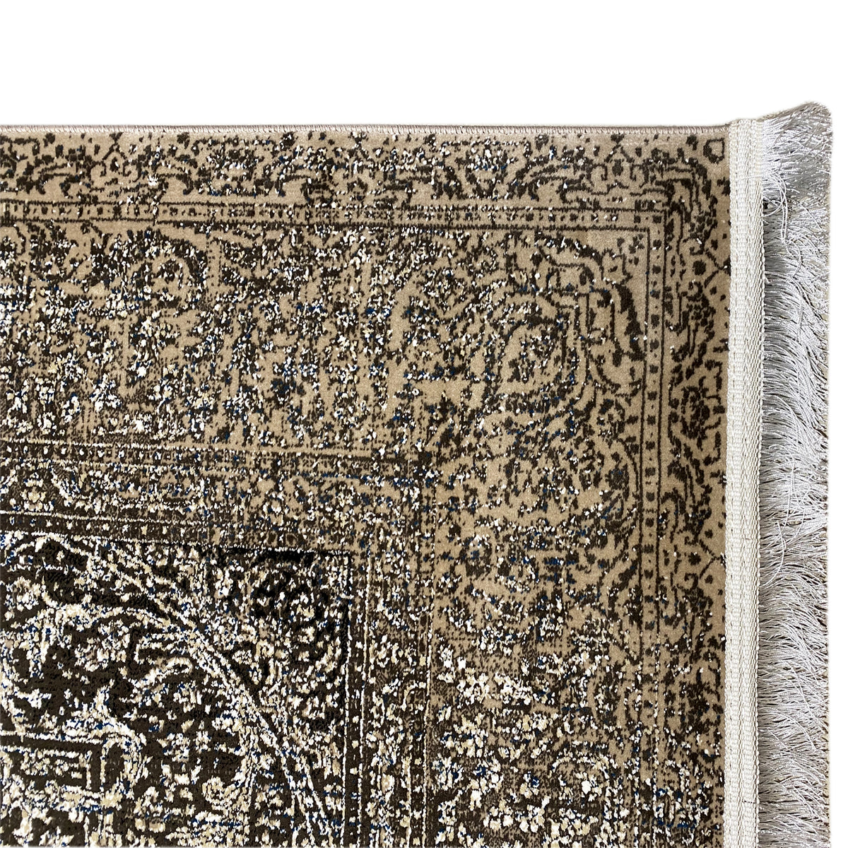Rectangular rug with a beige border design and light gray fringes