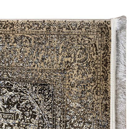 Rectangular rug with a beige border design and light gray fringes