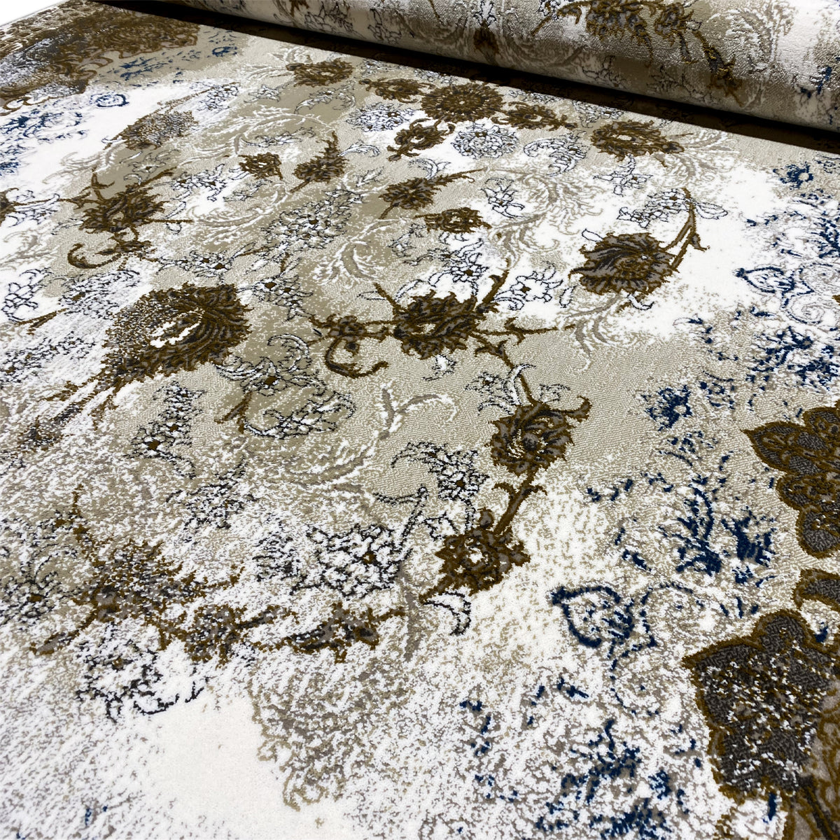 Beige rug with golden-brown and blue ornamental design, close-up of the surface