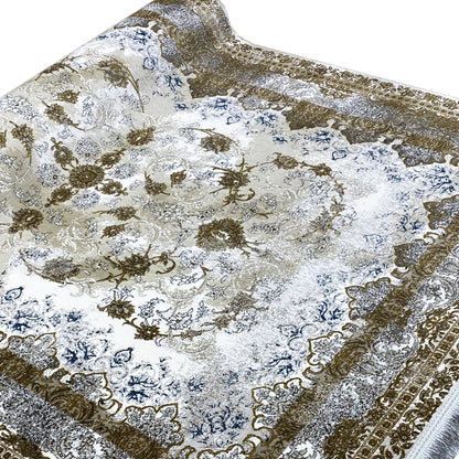 Beige rug with gold-brown and blue Baroque ornamental pattern, oblique view