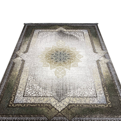 Rug zoom on the central star ornament in smoky green and gold, 170x240 cm