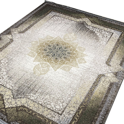 Rug detail: central star motif and gold accents in smoky green, 170x240 cm