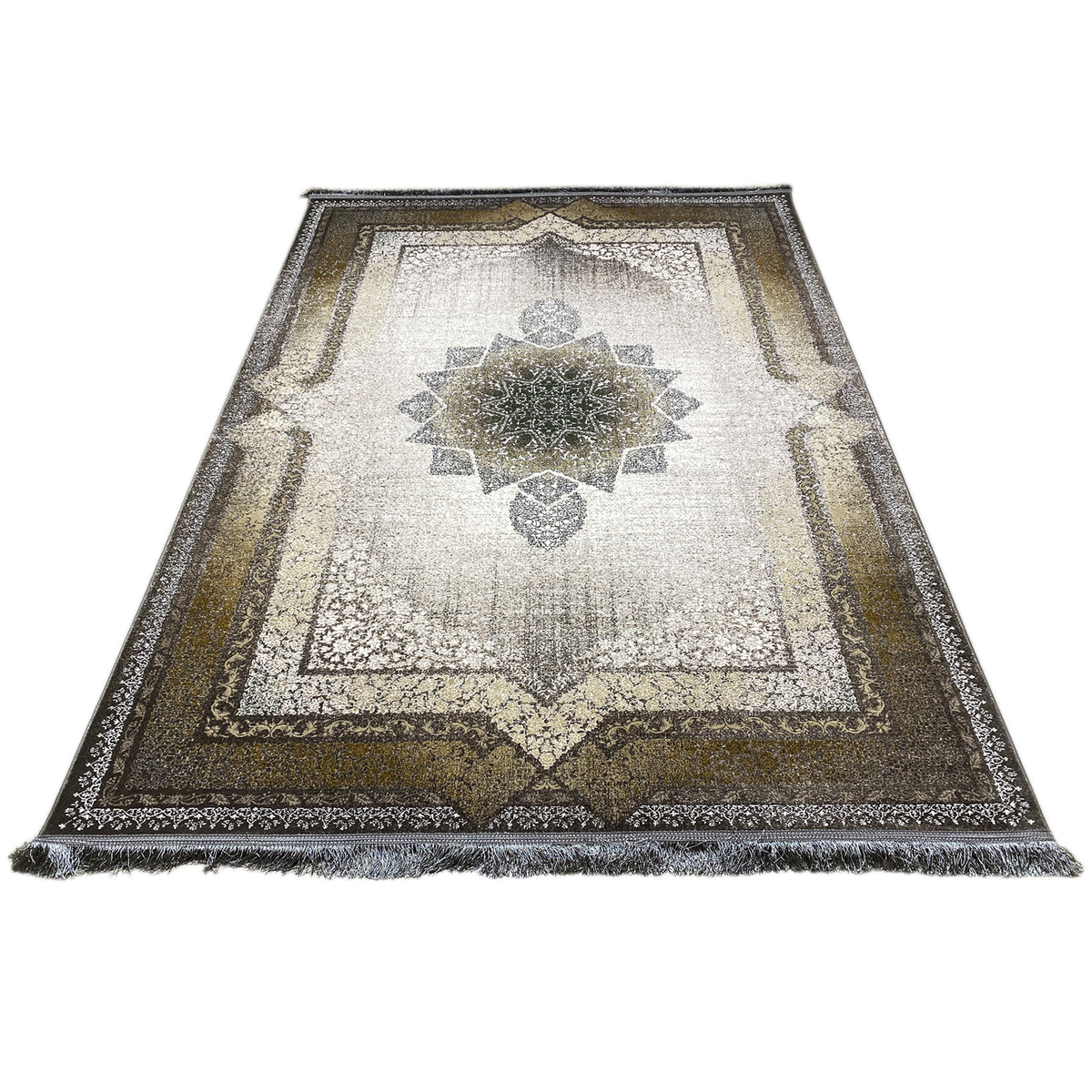 Rug with a central medallion, symmetrical pattern, and fringes along the edge in light, dark & gold tones
