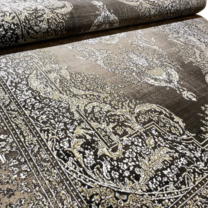 Rug medallion with ornamental decorative lines in silver-gray and dark tones