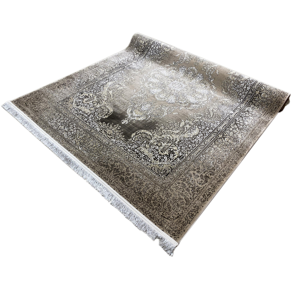 Rug with medallion patterns, antique silver-colored, with fringes along the edge